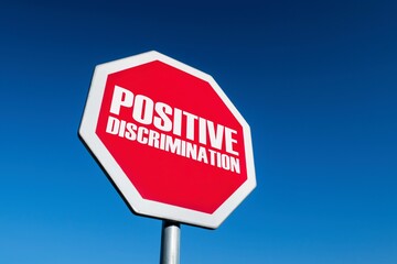 Stop sign as a symbol of overusing the positive discrimination in society as an issue of anti-racism fight