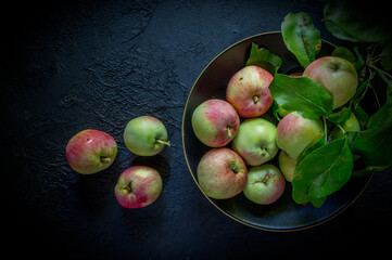 image of new crop apples on an old table