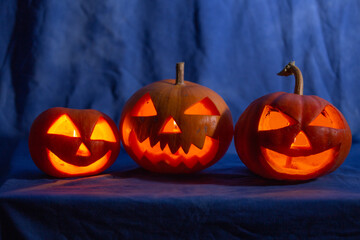 Scary halloween pumpkin for holiday on blue background