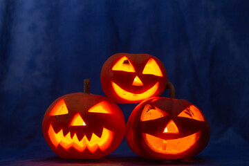 Scary halloween pumpkin for holiday on blue background