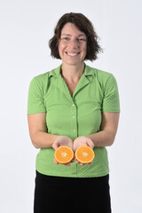woman with orange fruit on white background