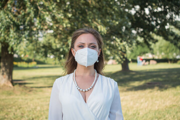 elegant girl in protective mask portrait