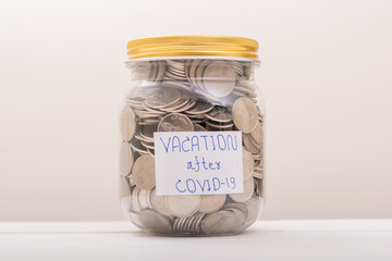  Saving Coins, Saving Money. Save Coin in Jar for vacation after COVID-19