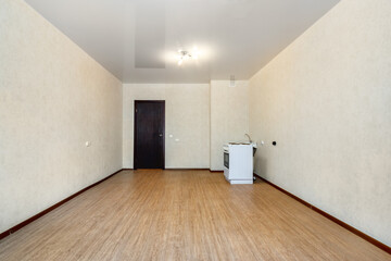 The front view a new kitchen without furniture and decoration and with gas stove