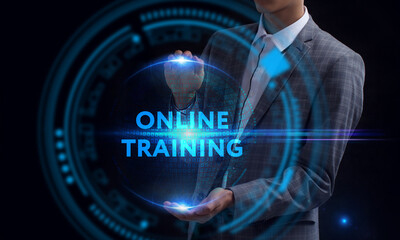 Business, Technology, Internet and network concept. Young businessman working on a virtual screen of the future and sees the inscription: Online training