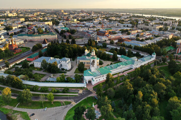 a panoramic view of the old fortress and church in the early morning at dawn filmed from a drone