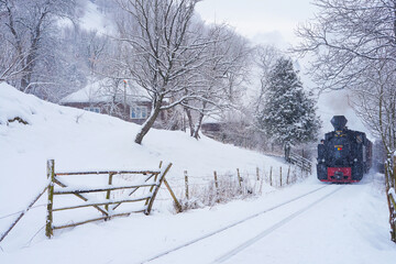 Mocanita Maramures steam train in winter time