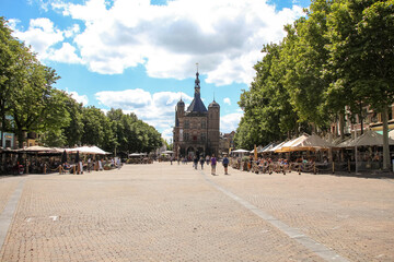 Deventer, Netherlands - July 11 2020: 16th century Weighing House (Waag gebouw) on Brink square in Deventer, Overijssel, oldest in The Netherlands