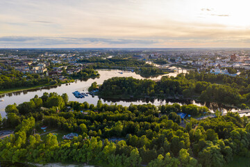 Fototapeta premium a large city with churches from the embankment along the river filmed from a drone