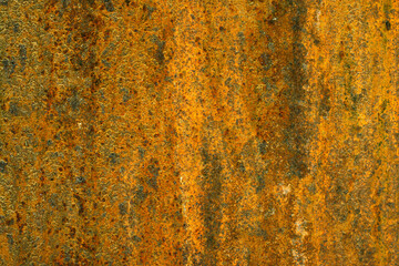 Old metal golden background. Golden grunge metal background and texture with scratches and cracks.