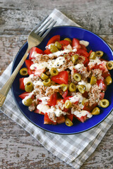 Salad with tuna, olives and tartar sauce. Healthly food. Fitness salad.