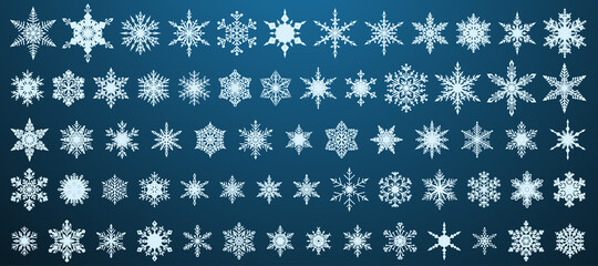 Set of beautiful complex Christmas snowflakes, white on blue background