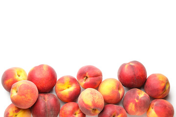 Many ripe peaches on light background