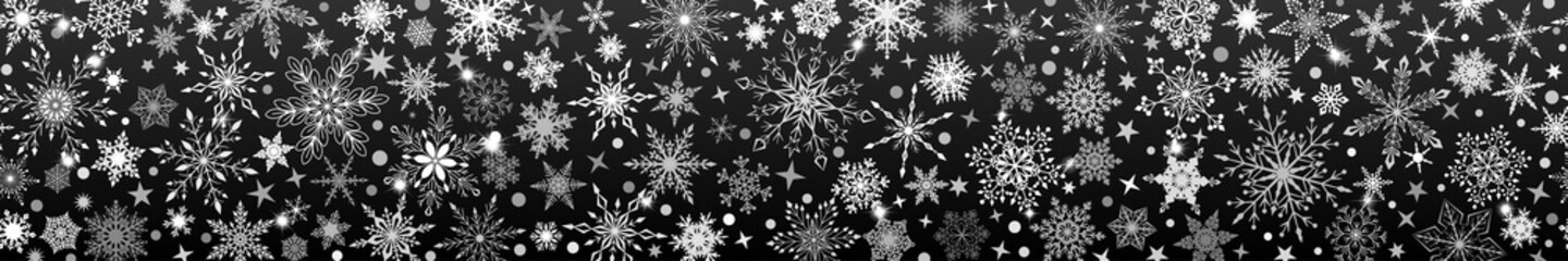 Naklejka na ściany i meble Christmas banner of various complex big and small snowflakes with horizontal seamless repetition, white on black background