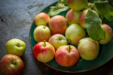 image of new crop apples on an old table