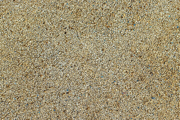 Gravel background. Gravel texture abstract background. Playground sand texture.