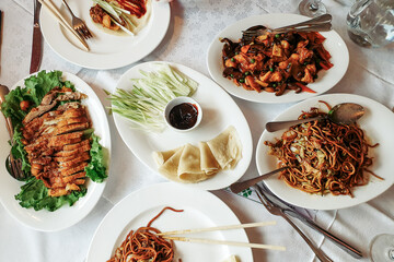 Assorted Chinese food set. Famous Chinese cuisine dishes on table. Top view. Chinese restaurant concept. Asian style banquet
