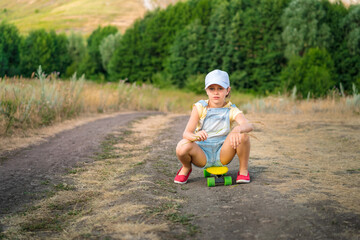 Sullen displeased preteen girl skateboarder poses with skateboard, has bad mood, cannot enjoy favorite hobby because of serious injury. Unlucky rest