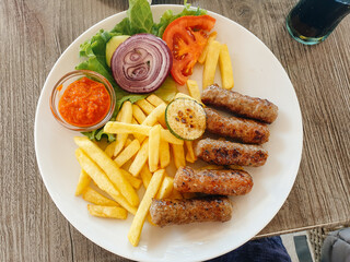 Cevapcici, a small skinless sausage cooked on the barbecue