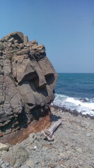 funny rock in the ocean
