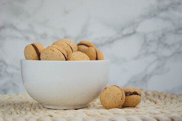 Baci di dama, italian biscuits with chocolate