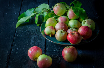 image of new crop apples on an old table