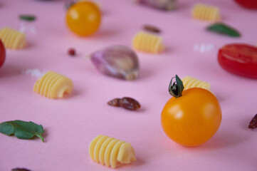 Food pattern photography yellow cherry tomato pink background