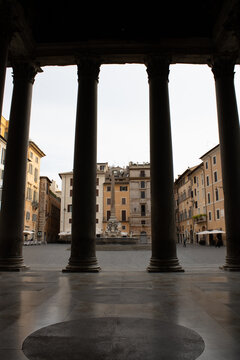 View of the fountain from inside the Panthon of Rome, empty due the pandemic