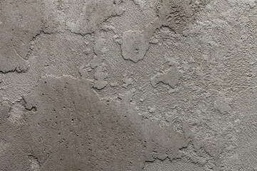 Abstract gray concrete wall plaster texture.