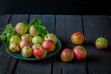 image of new crop apples on an old table