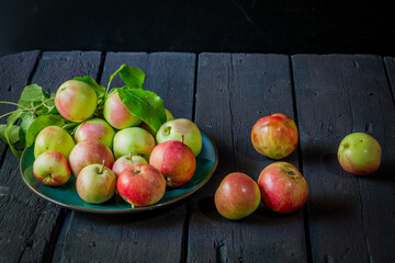 image of new crop apples on an old table