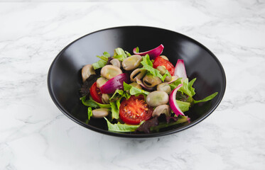 Salad tomato red onion vegetables diet, marble background