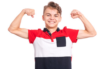 Portrait of funny teen boy raised his hands and shows biceps, isolated on white background. Handsome teenage young boy shows biceps. Happy strong child flexing biceps.