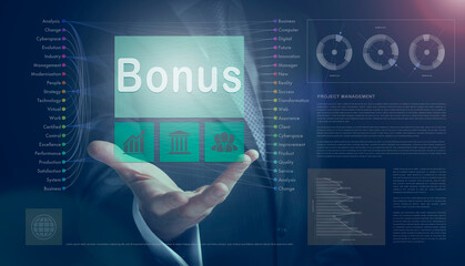 Businessman outreached hand holding a Bonus business concept on a computerised screen display.