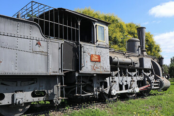 Old locomotive next to the railway station