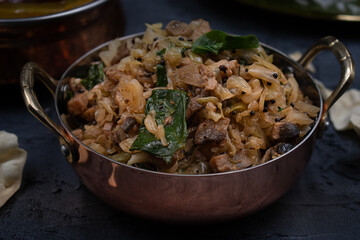 Indian cabbage and mushroom curry, close up