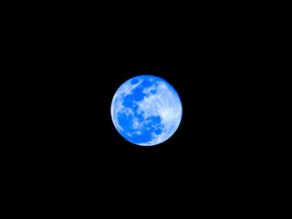 Blue Full Moon on The Middle of Frame