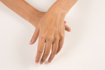 Fototapeta premium beautiful woman hands applying moisturizing cream to her skin