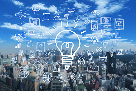 東京の町並みとビジネスアイデア-スマホ・パソコン・ネットワーク・閃き - Powered by Adobe