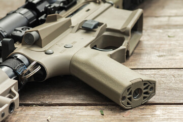 Military AR15 automatic assault rifle weapon with aim sight and flashlight
