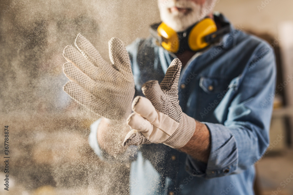 Wall mural unrecognizable workingman wearing gloves