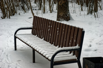 Park bench in the snow, Moscow