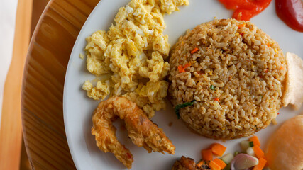 Fried rice or Nasi Goreng with scrambled egg, chicken and shrimp