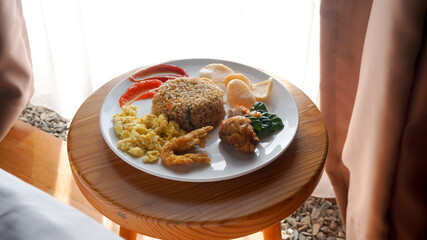 Fried rice or Nasi Goreng with scrambled egg, chicken and shrimp