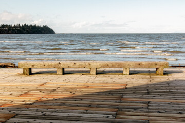 Wooden Bench Facing the Ocean