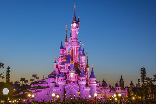 Night performance near Sleeping Beauty castle in Disneyland Paris. Disneyland Paris (Euro Disney Resort) - entertainment resort in Marne-la-Vallee. Marne-la-Vallee, France. March 30, 2019.