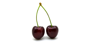 Two cherries on a twig