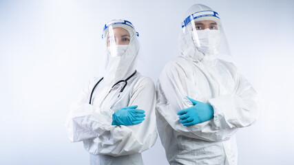 Couple doctors wear face mask, gloves and face shield. covid19 concept.