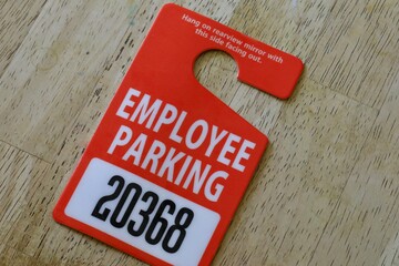 Rear view mirror hanging tag for parking privileges 