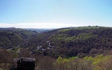 a panoramic view of the calder valley in west yorkshire showing the trees around the colden valley...